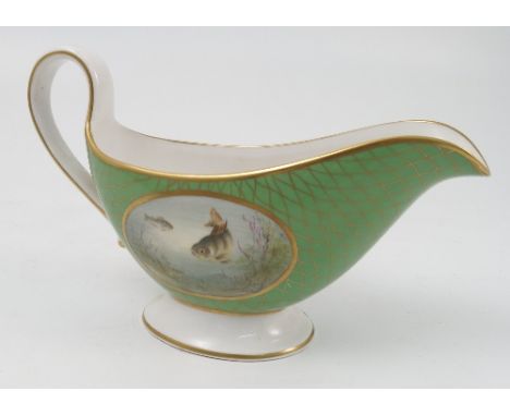 A Spode porcelain sauce boat, decorated with two oval reserve of Perch and Grayling, to a green and gilt ground, height 5ins 