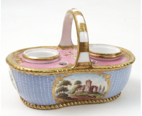 A 19th century Spode porcelain ink stand, modelled as a shaped oval basket with fixed handle, having two ink pots and four pe