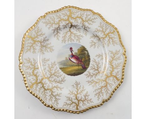 A Flight, Barr and Barr Worcester plate, decorated with central panel of a fabulous bird to a seaweed border, diameter 9ins C