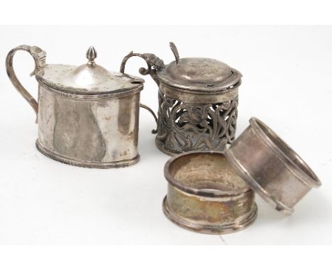 A collection of hallmarked silver, to include two lidded mustard pots, a pair of napkin rings engraved with an initial, a chr