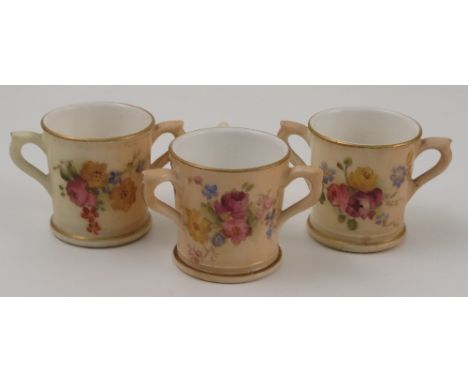 Three Royal Worcester miniature three handled tygs, all decorated with flowers, various dates, height 1.75ins Condition repor