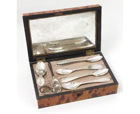 A 19th century Dutch silver tea serving set, comprising twelve teaspoons, with bright cut decoration, a caddy spoon with simi