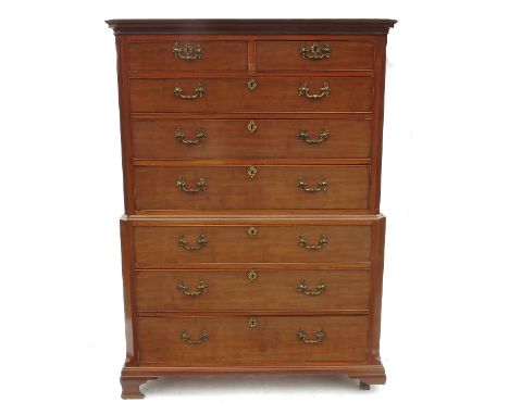A late Georgian mahogany chest on chest, the upper section fitted two short drawers over three long drawers with canted reede