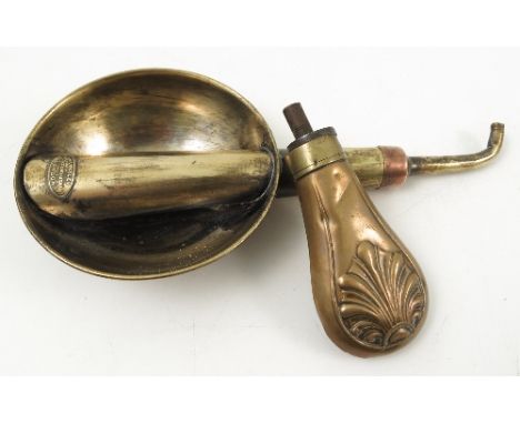 A brass hearing aid, by Hawksley of London, together with a small brass shot flask