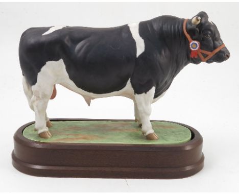 A Royal Worcester model, British Fresian Bull, modelled by Doris Lindner, circa 1964, with wooden plinth but NO certificate C