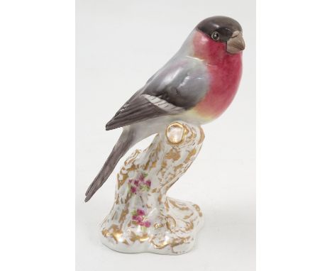 A Royal Worcester model, Bullfinch, on a gilt and white stump decorated with flowers, model number 2662 Condition report: goo