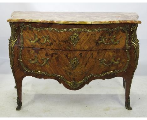 A Continental Antique Kingwood commode, with marble top, of serpentine outline and of slight bombe form, fitted two drawers w