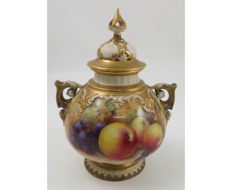 A Royal Worcester covered pot pourri, decorated to the front with hand painted fruit to a mossy background by H H Price, to g