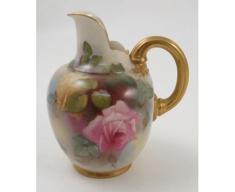 A Royal Worcester flat back jug, decorated with pink and yellow roses, dated 1911, shape number 1094, height 4.5ins Condition