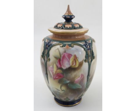 A Hadleys Worcester covered vase, the body divided into panels and decorated with flowers and leaves, with pierced cover, hei