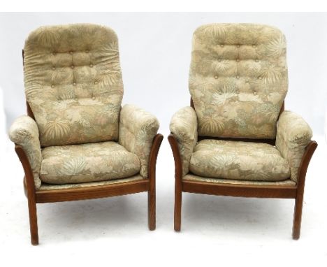 A pair of Ercol ladder back armchairs 