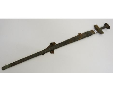 A Nigerian tribal ceremonial sword, in tooled leather scabbard, stamped marks to the blade, together with a letter of provena