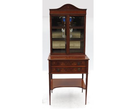 An Edwardian mahogany cheveret, with glazed upper section and with marquetry and satinwood line inlay, raised on square taper
