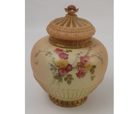 A Royal Worcester blush ivory pot pourri, with pierced cover, the body decorated with floral sprays, with basket moulded lowe