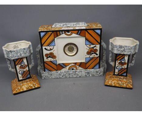 French porcelain Art Deco styled clock garniture, clock with square form with enamel Arabic chapter ring, two stepped columns