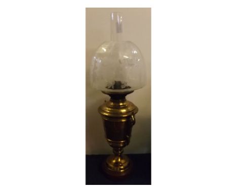 Victorian brass and engraved vase shaped oil lamp with clear etched floral shade, 23 1/2 ins tall  