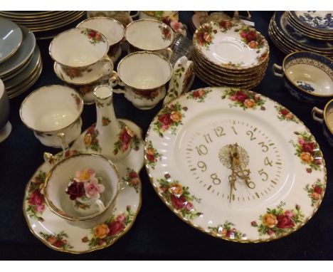 Part set of Royal Albert Old Country Rose comprising 7 cups and saucers, further vase, plate formed wall mounted clock, small