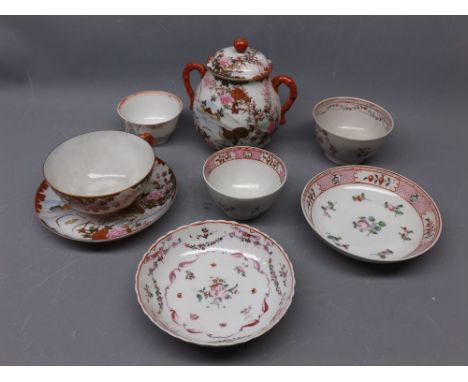 Japanese decorated cup and saucer with a painted and gilded design, together with a matching two-handled covered sugar pot an