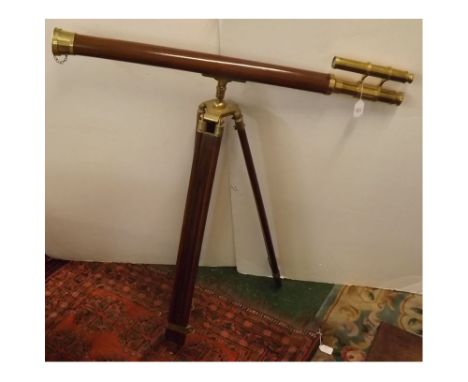 Reproduction mahogany and brass mounted telescope on extendable tripod base, 38ins long  