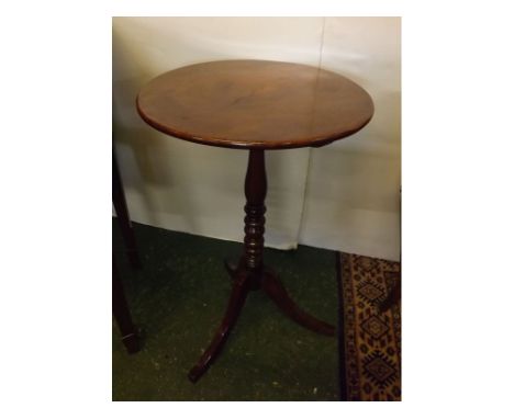 19th century mahogany circular topped wine table with turned column on a splayed tripod base, 19ins diam x 30ins high  