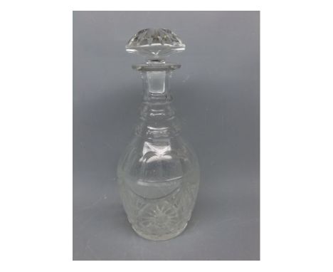 Late 19th or early 20th century three-ringed clear glass mallet formed decanter and stopper, 12ins tall 