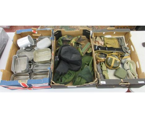 Collection of ex army hats webbing, billy cans etc.