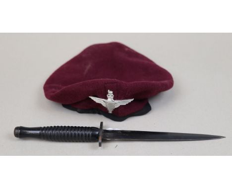 Fairbairn Sykes commando dagger together with a Parachute Regiment beret 