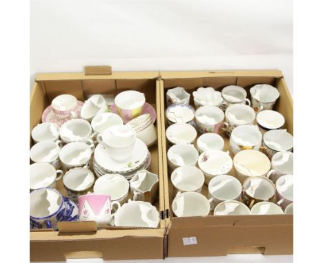 Large collection Victorian and later moustache cups, some with saucers, in two boxes