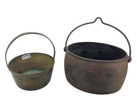 Kenrick & Sons five gallon cast iron cooking pot, together with a brass preserve pan (2)