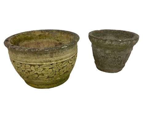 Circular cast stone garden planter decorated with flower head band (D44cm, H28cm); smaller planter (D34cm, H27cm); composite 