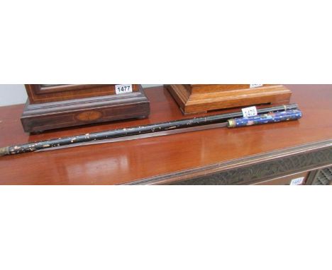 A Sword stick with enamelled handle (damage to enamel)