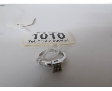 An 18ct white gold 20pt diamond ring, size K