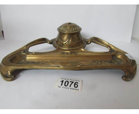 An art nouveau brass inkstand
