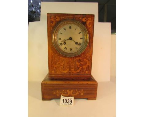 An Early French inlaid mantel clock marked Laine, Paris. In working order