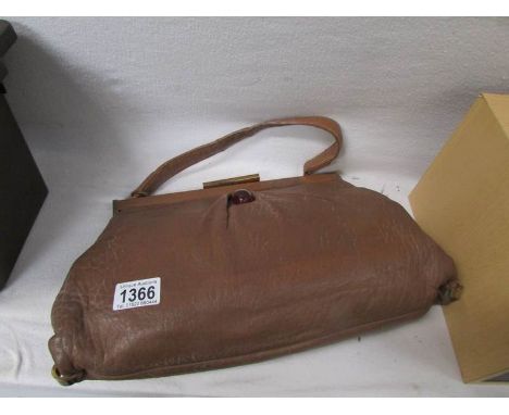 An Art deco leather hand bag
