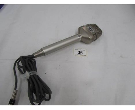 A vintage TEAC MC-210 Back Electret Condenser stereo microphone
