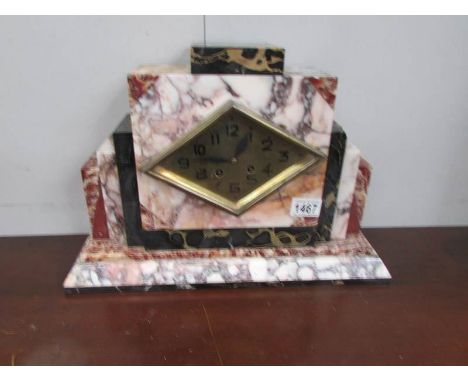 An art deco onyx/marble mantel clock