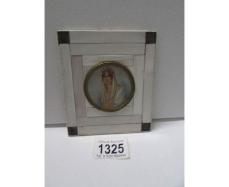 A miniature portrait painted on ivory