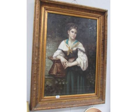 A large gilt framed portrait of a young girl
