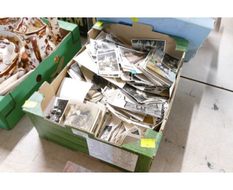 Box of vintage photographs and postcards