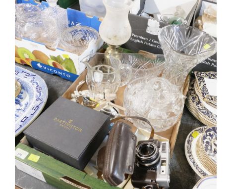 Box of glassware, oil lamp converted to electric, Dartington Crystal clock, Oneida cutlery, vintage camera, helicopter and bi