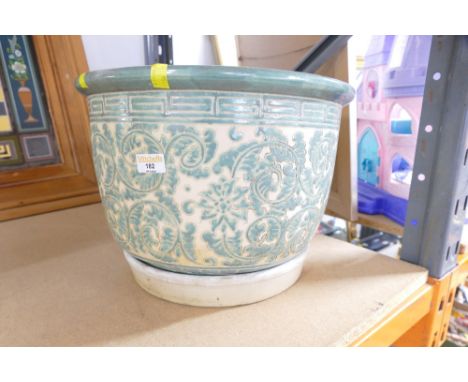 Large green and white pattern planter and ceramic tray