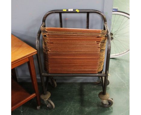 Vintage school dinner trays on trolley stand