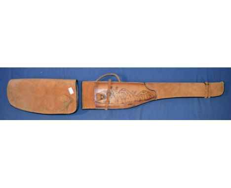 Light brown suede and leather gunslip with scene of deers stamped on it. 