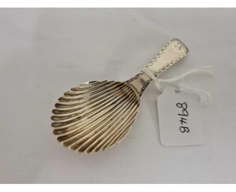 A Hester Bateman caddy spoon with oval fluted bowl and bright cut handle, London 1789