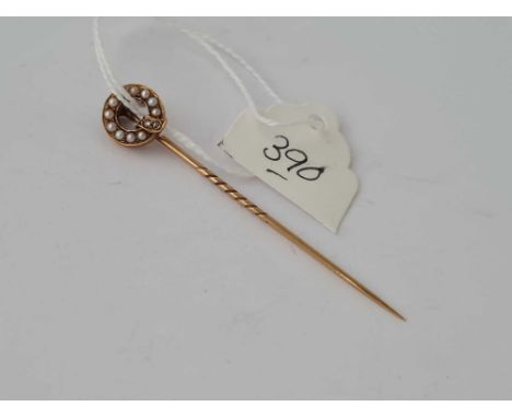 A gold, diamond &amp; pearl top stick pin