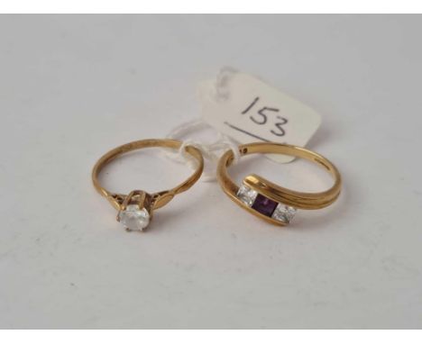 A three stone cross over ring and a single stone ring sizes P&amp;N  1/2 