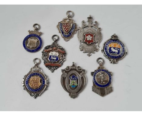 Eight silver and enamel football fobs 89g