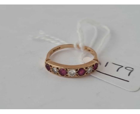 A seven stone ruby and diamond ring 9ct size N - 1.8 gms 