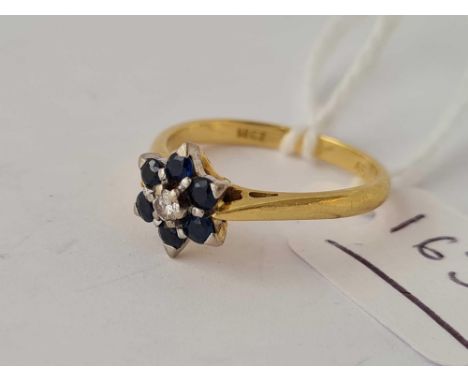 A sapphire and diamond ring 18ct gold size m - 2.9 gms 